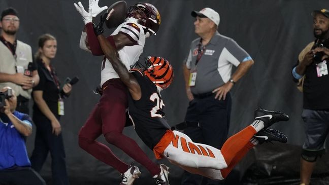 Cincinnati Bengals cornerback Dax Hill gives up a touchdown to Washington Commanders wide receiver Terry McLaurin during an NFL game on Monday, Sept. 23, 2024. (AP Photo/Carolyn Kaster)