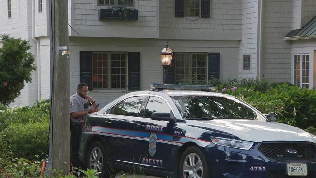 This is a Friday morning, July 8, 2022, photo of Fairfax County PD outside the home. (7News)