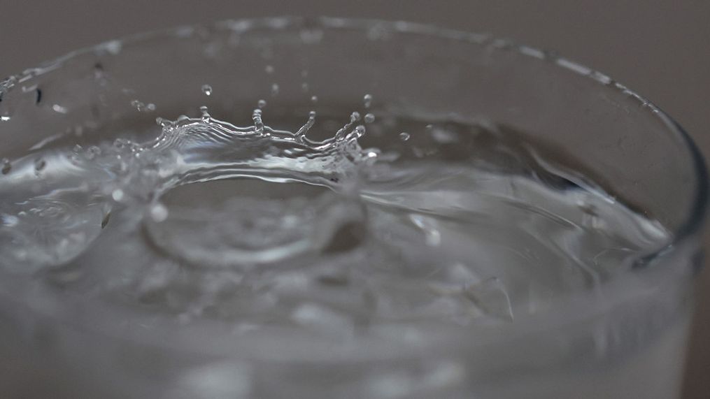 SAN ANSELMO, CALIFORNIA - JULY 06: In this photo illustration, tap water drops into a glass on July 06, 2023 in San Anselmo, California. According to a study by the US Geological Survey, nearly half of the tap water in the United States is contaminated with "forever chemicals" that are considered dangerous to human health. Per and polyfluorinated alkyl substances, or PFAS, are chemicals that linger in the body and are linked to health issues like cancer, obesity, liver damage, decreased fertility, thyroid disease, high cholesterol and hormone suppression. (Photo Illustration by Justin Sullivan/Getty Images)